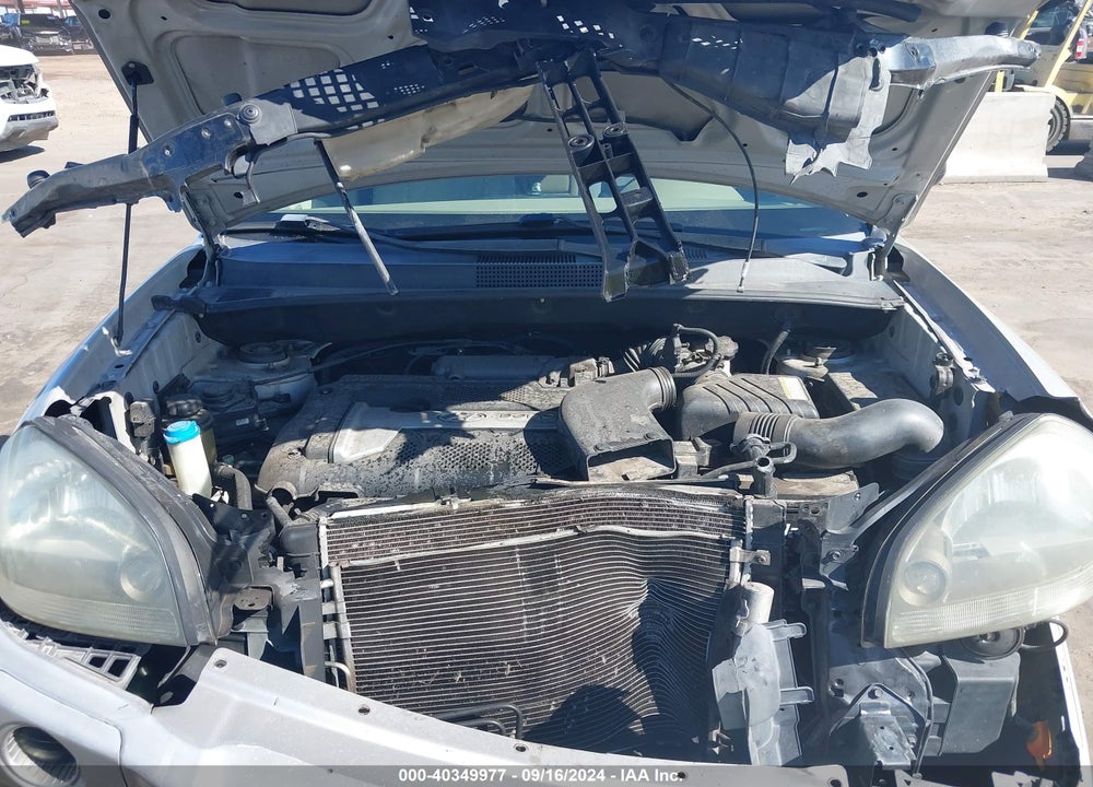 2005 HYUNDAI TUCSON GL VIN: KM8JM12B05U097905
