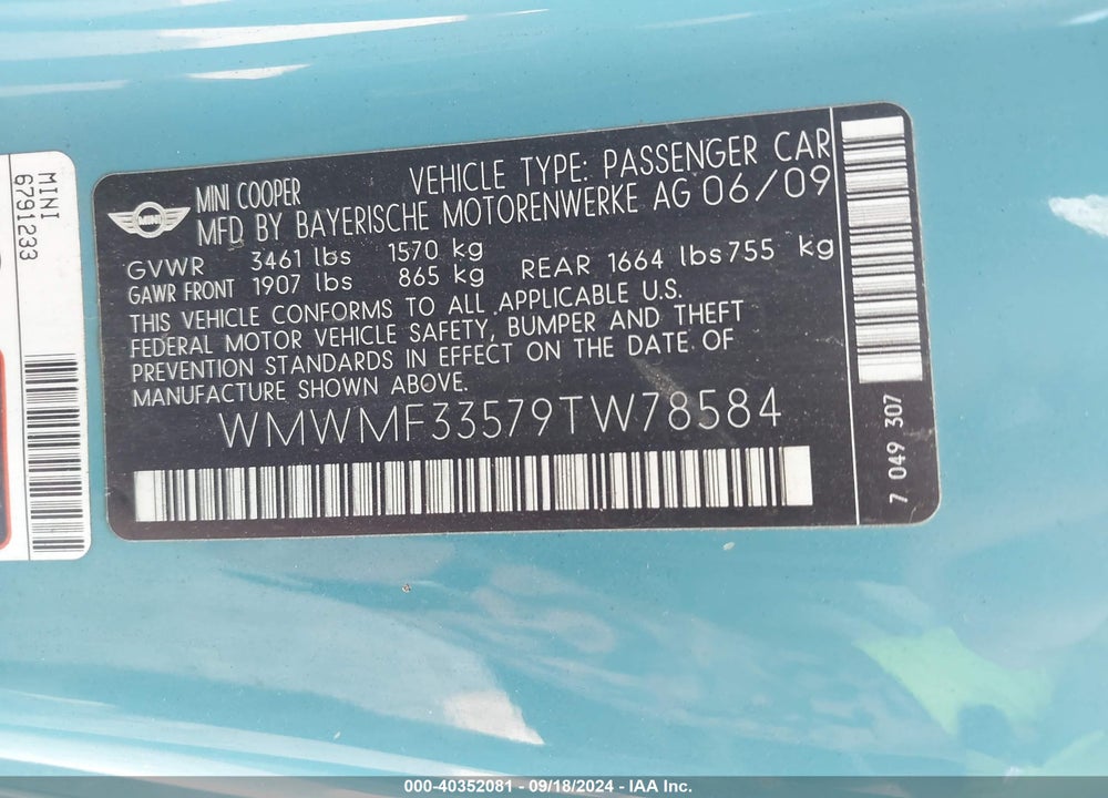 2009 MINI COOPER VIN: WMWMF33579TW78584