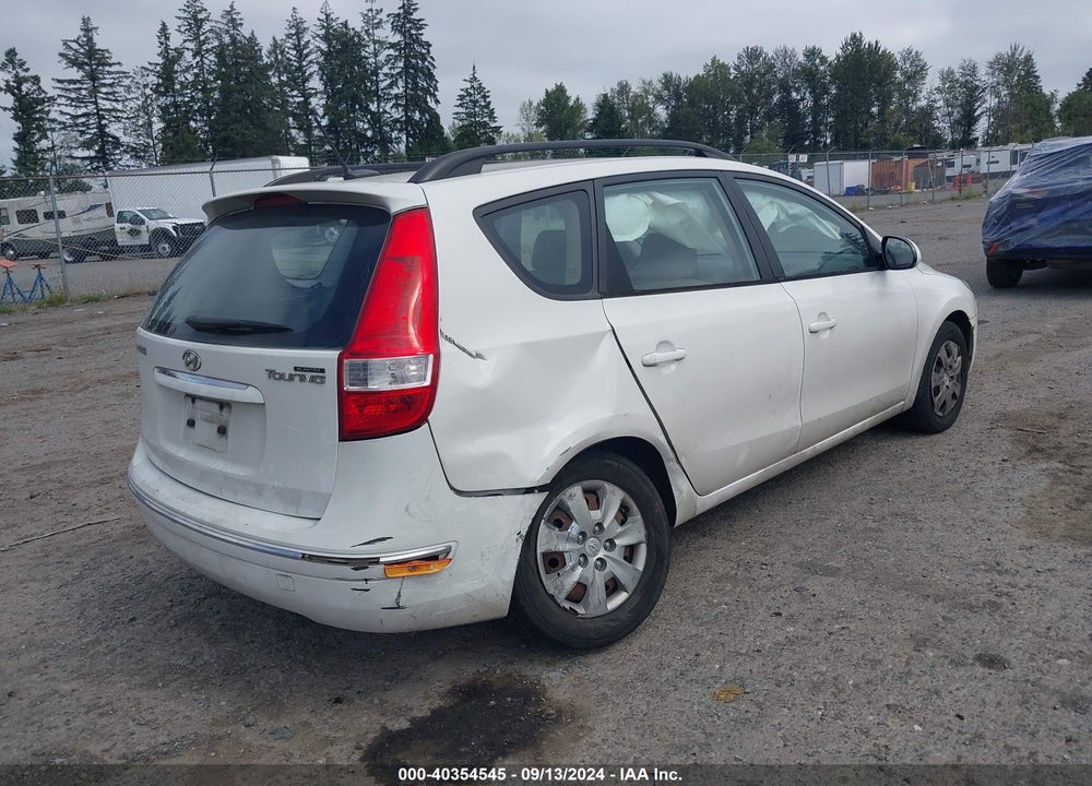 2010 HYUNDAI ELANTRA TOURING GLS VIN: KMHDC8AE0AU075465