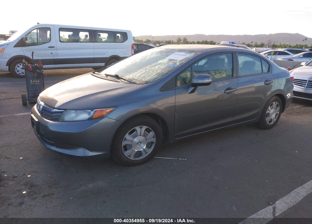 2012 HONDA CIVIC HYBRID VIN: JHMFB4F30CS002335