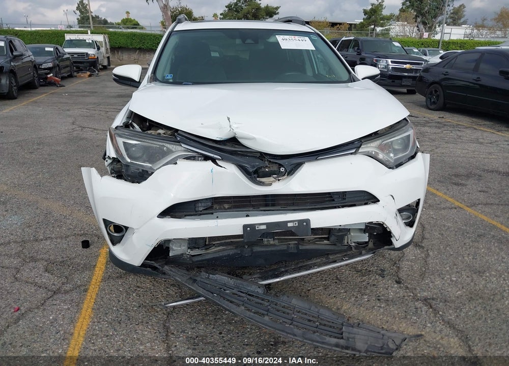 2018 TOYOTA RAV4 XLE VIN: 2T3RFREV5JW789404