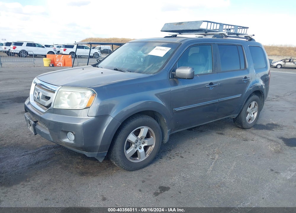 2011 HONDA PILOT EX-L VIN: 5FNYF4H74BB089215