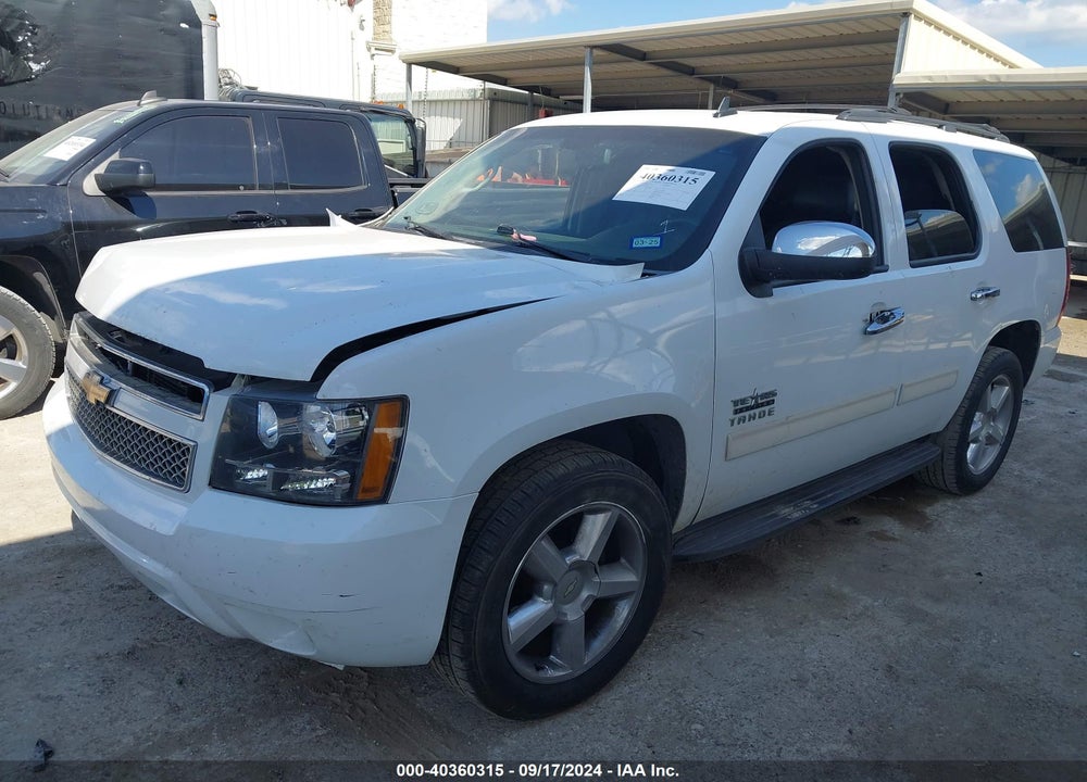 2011 CHEVROLET TAHOE LS VIN: 1GNSCAE01BR143057