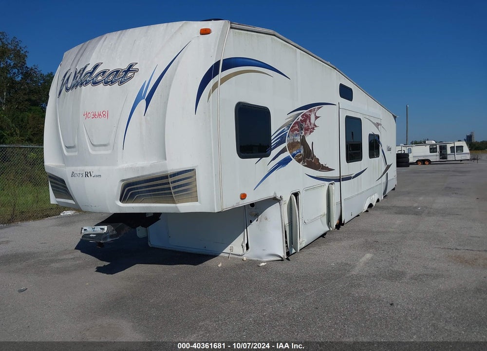 2011 FOREST RIVER WILDCAT 32 QBT 3 SLIDES VIN: 4X4FWCH2XBV024032