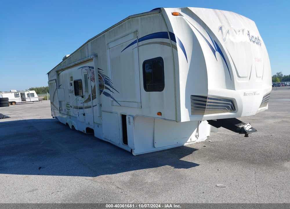 2011 FOREST RIVER WILDCAT 32 QBT 3 SLIDES VIN: 4X4FWCH2XBV024032