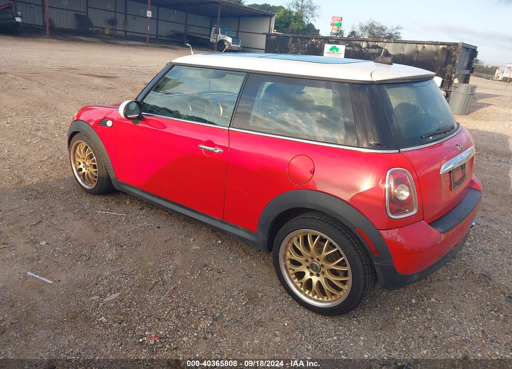 2009 MINI COOPER VIN: WMWMF33529TW72014