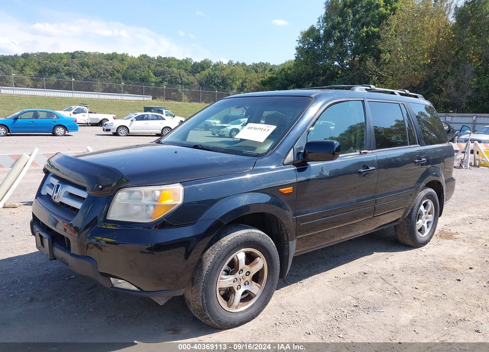 2006 HONDA PILOT EX-L VIN: 2HKYF18706H527279