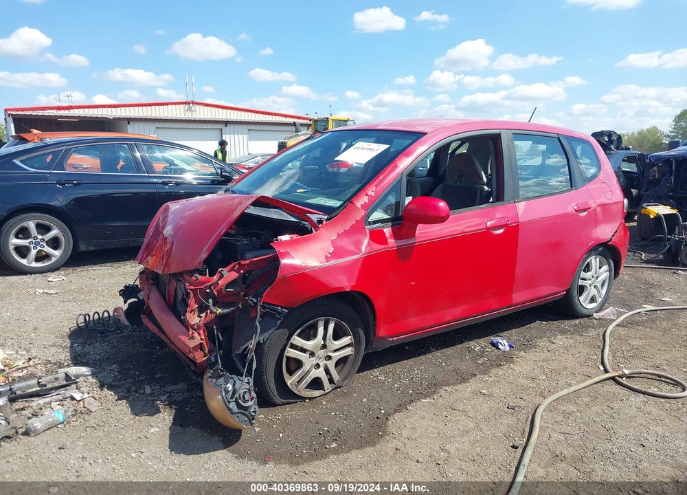 2007 HONDA FIT VIN: JHMGD38417S046090
