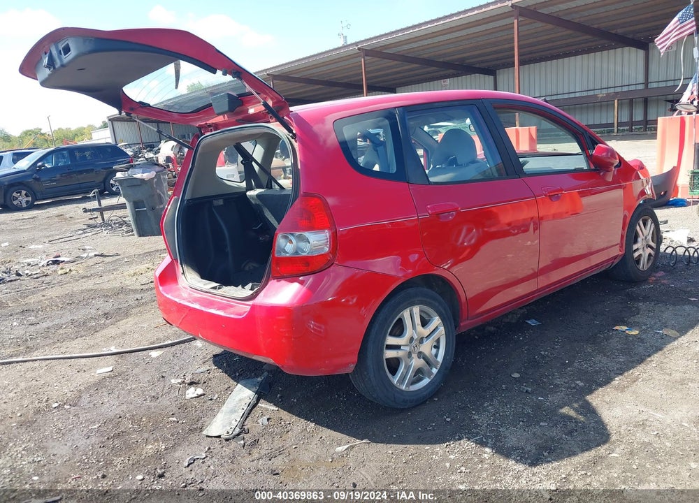 2007 HONDA FIT VIN: JHMGD38417S046090