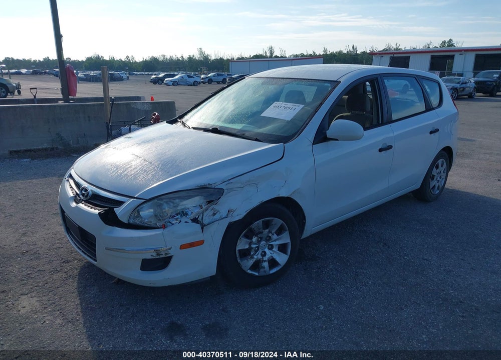 2010 HYUNDAI ELANTRA TOURING GLS VIN: KMHDB8AE6AU059192