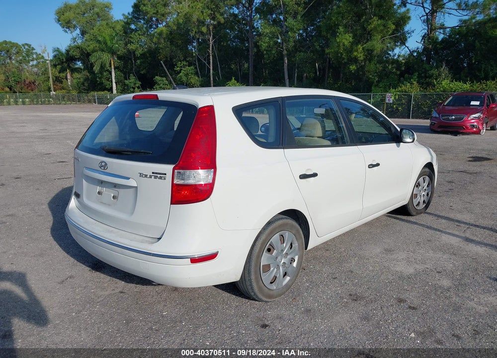 2010 HYUNDAI ELANTRA TOURING GLS VIN: KMHDB8AE6AU059192
