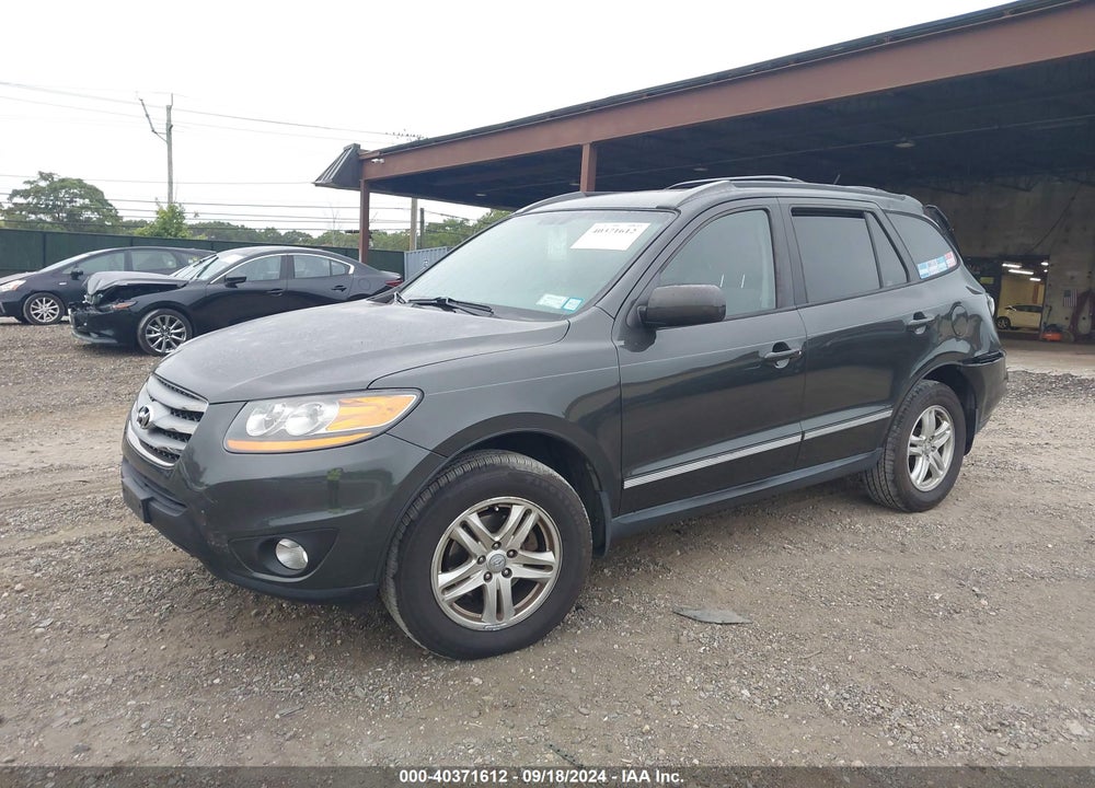 2012 HYUNDAI SANTA FE SE VIN: 5XYZHDAG7CG161821