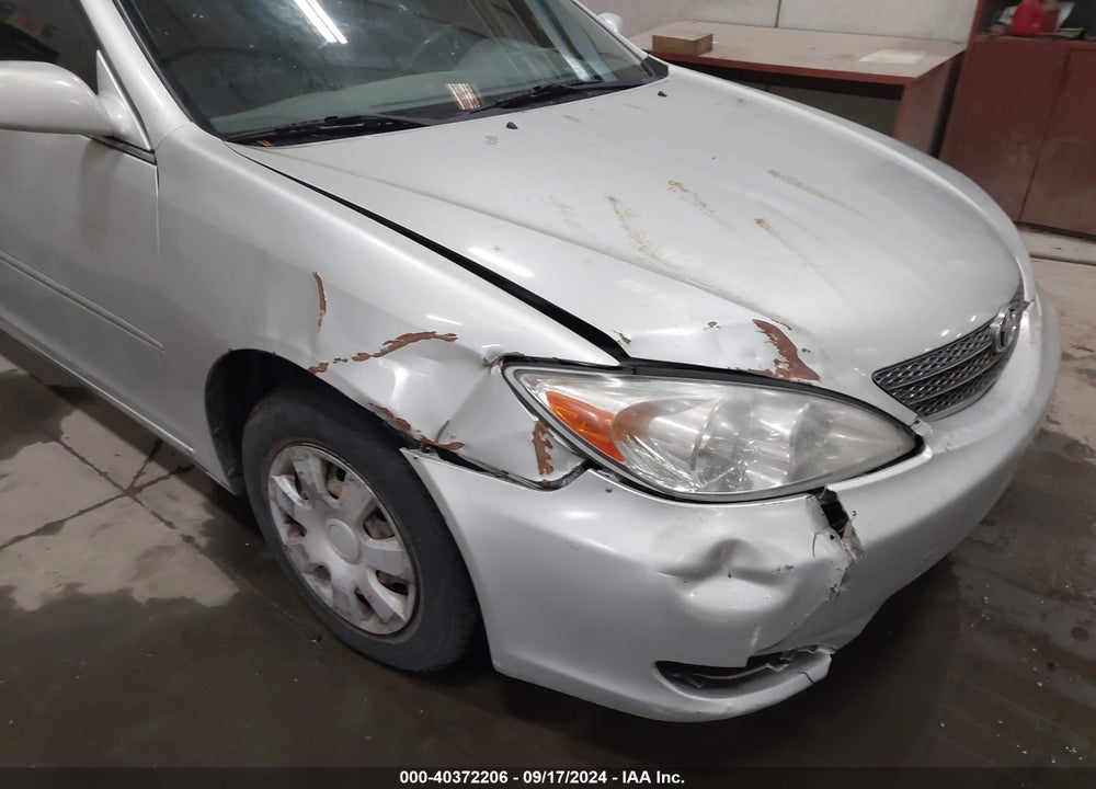 2002 TOYOTA CAMRY LE VIN: JTDBE32K720105387