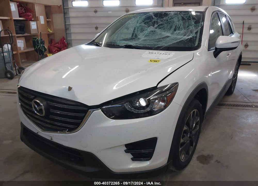 2016 MAZDA CX-5 GRAND TOURING VIN: JM3KE4DY7G0734492