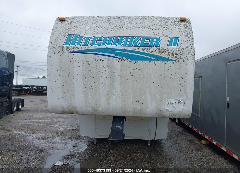 1998 NU-WA HITCHHIKER II, 31 CKTGBW,  5TH WHEEL, 3 SLD WHITE VIN: 1C932JP0XWA008252