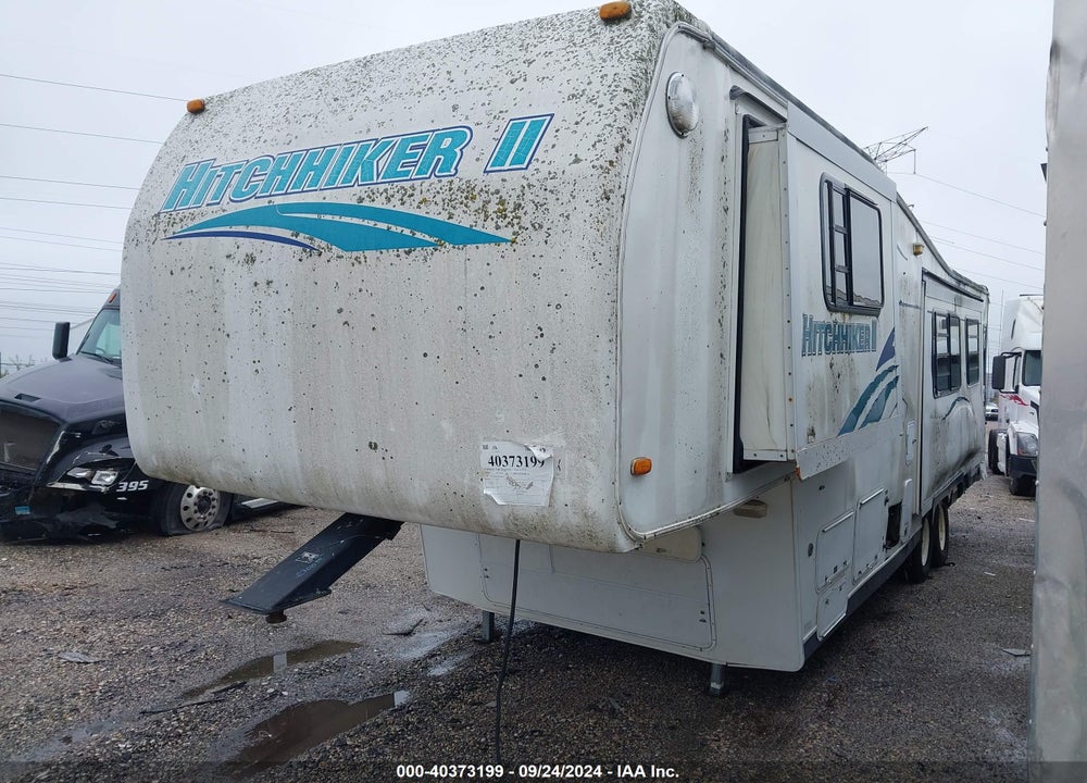 1998 NU-WA HITCHHIKER II, 31 CKTGBW,  5TH WHEEL, 3 SLD WHITE VIN: 1C932JP0XWA008252