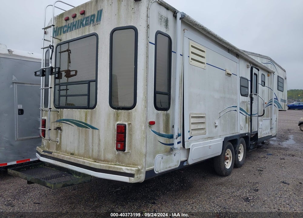 1998 NU-WA HITCHHIKER II, 31 CKTGBW,  5TH WHEEL, 3 SLD WHITE VIN: 1C932JP0XWA008252