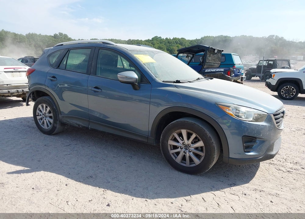 2016 MAZDA CX-5 SPORT VIN: JM3KE2BY3G0718460