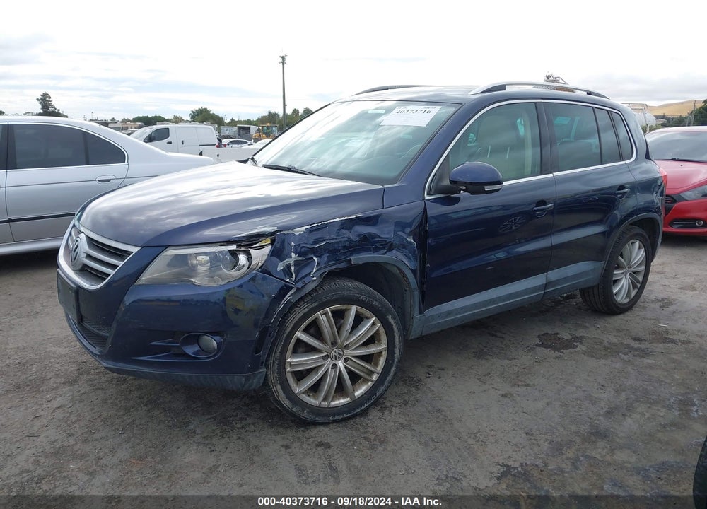 2011 VOLKSWAGEN TIGUAN SEL VIN: WVGAV7AX7BW000230