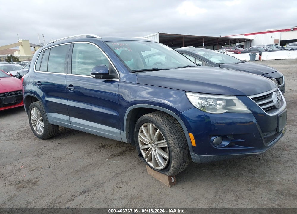 2011 VOLKSWAGEN TIGUAN SEL VIN: WVGAV7AX7BW000230