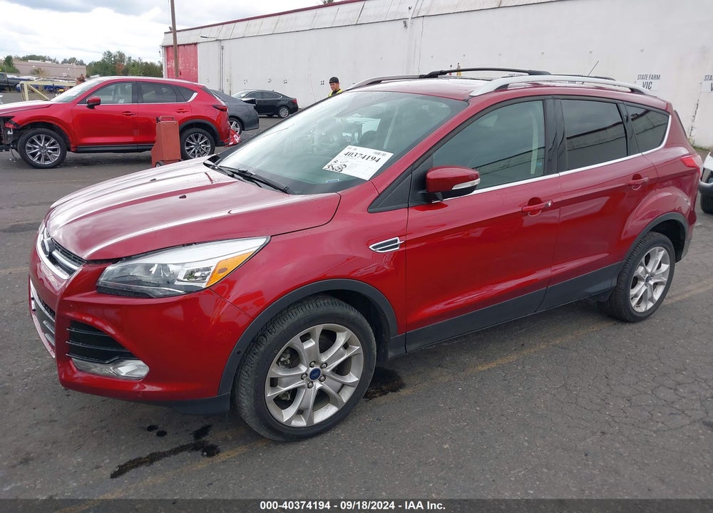 2016 FORD ESCAPE TITANIUM VIN: 1FMCU9J98GUC81210