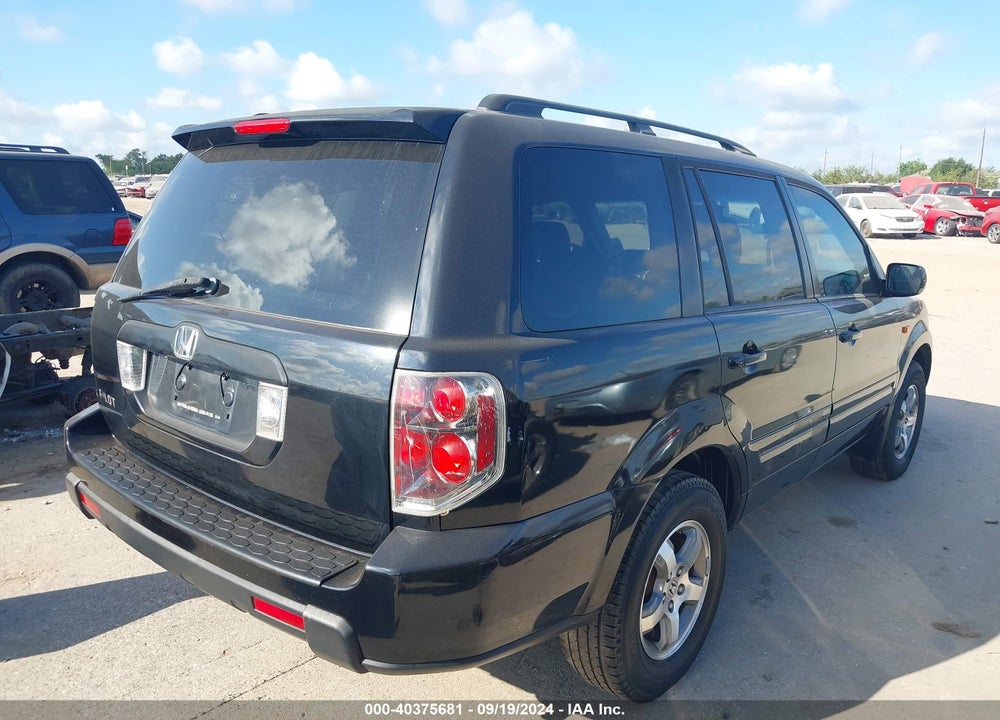 2006 HONDA PILOT EX-L VIN: 5FNYF28596B020948