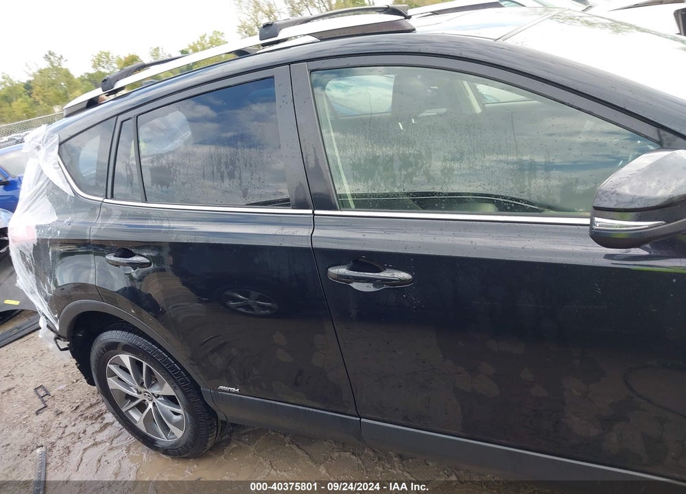 2016 TOYOTA RAV4 HYBRID XLE VIN: JTMRJREV3GD039231