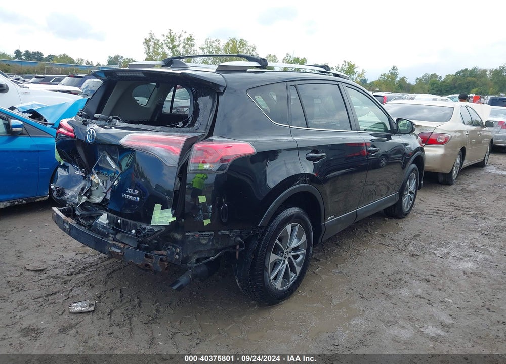 2016 TOYOTA RAV4 HYBRID XLE VIN: JTMRJREV3GD039231
