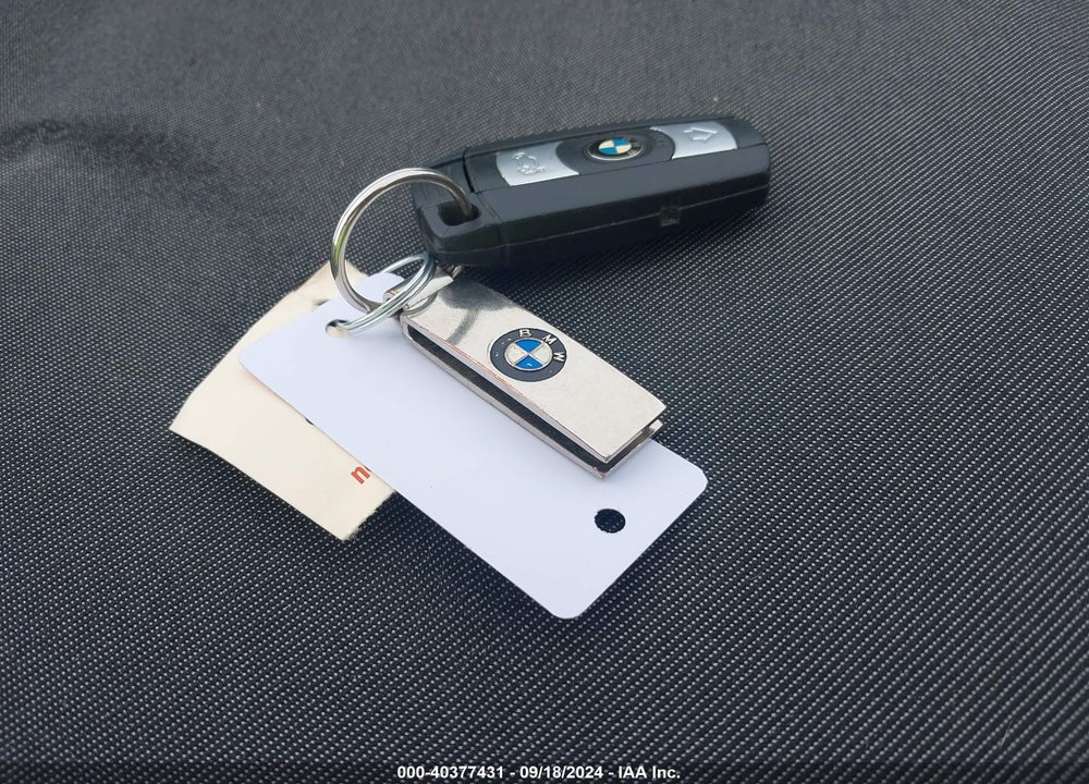 2013 BMW 135I VIN: WBAUN7C58DVM27404