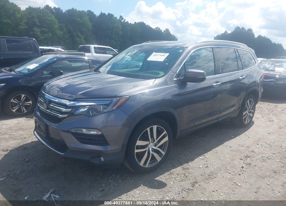 2016 HONDA PILOT TOURING VIN: 5FNYF6H91GB123714