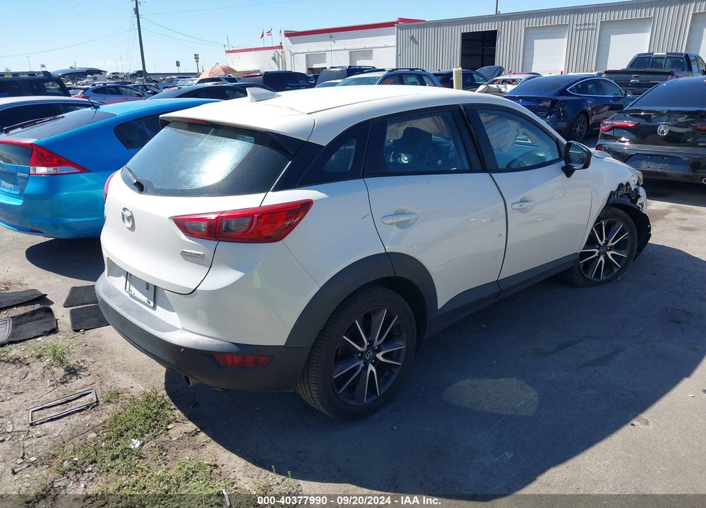 2018 MAZDA CX-3 TOURING VIN: JM1DKDC76J0329895