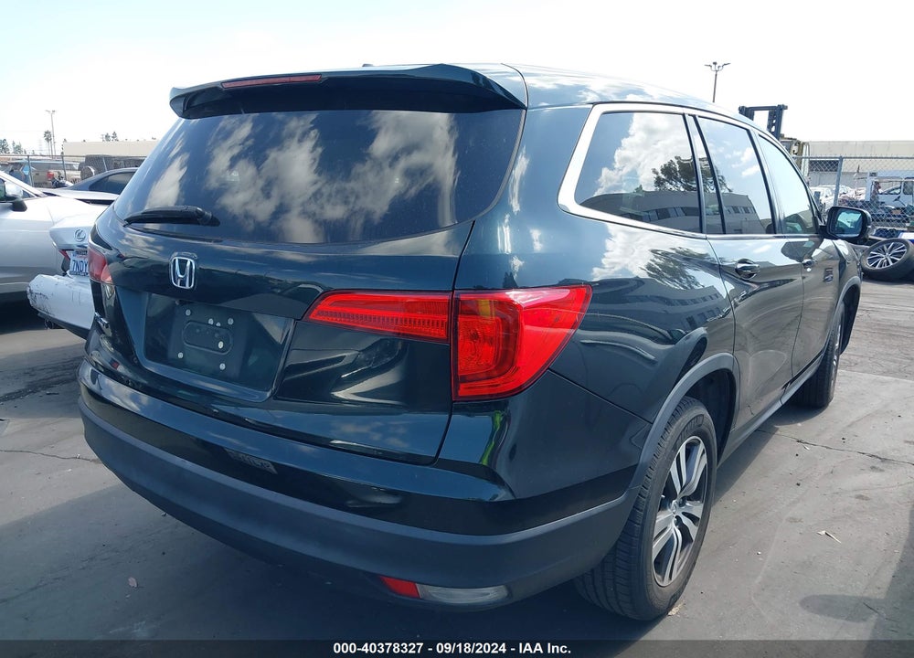 2016 HONDA PILOT EX-L VIN: 5FNYF5H72GB052385