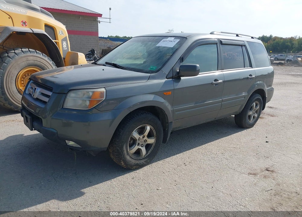 2007 HONDA PILOT EX-L VIN: 5FNYF18557B020991