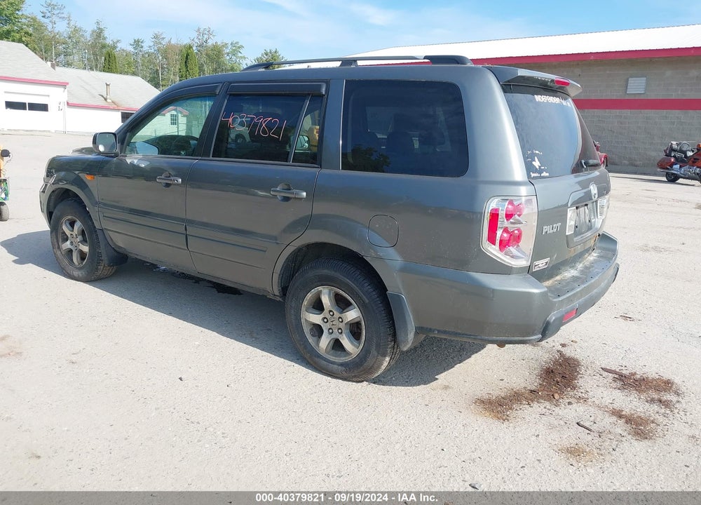 2007 HONDA PILOT EX-L VIN: 5FNYF18557B020991
