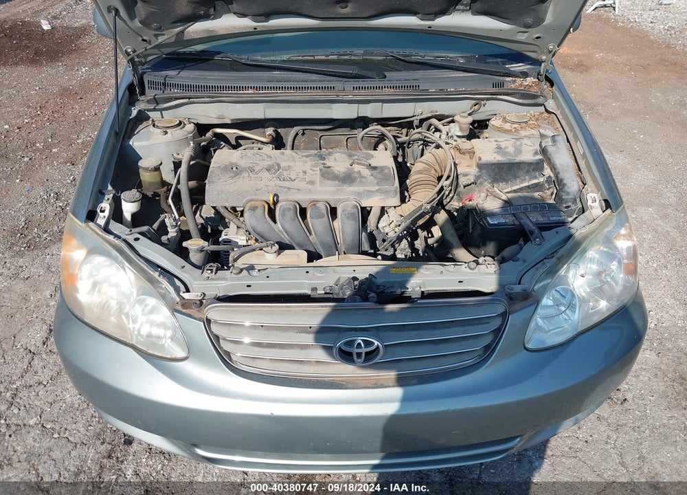 2004 TOYOTA COROLLA LE VIN: 2T1BR32E04C311710