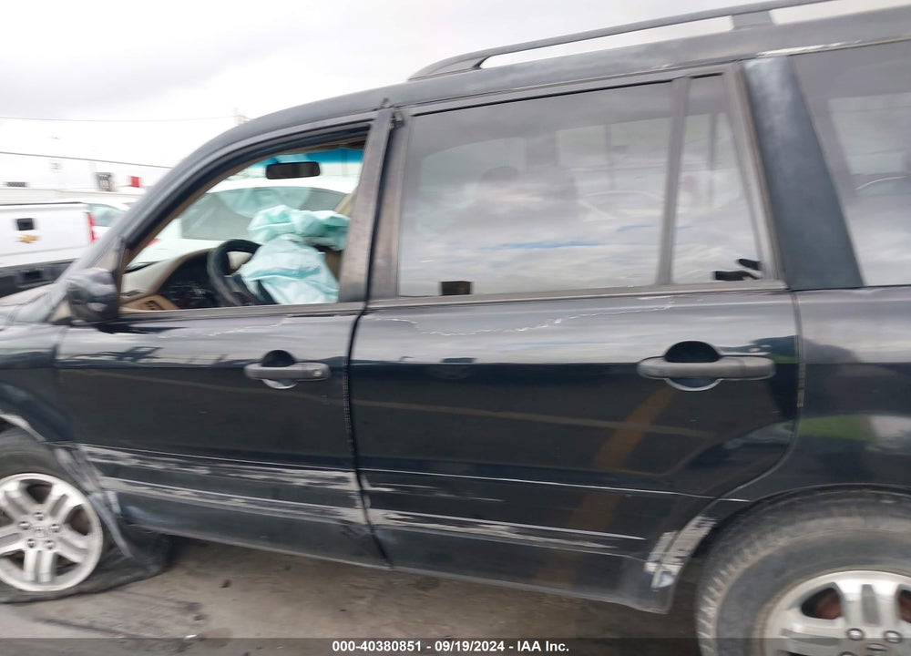 2004 HONDA PILOT EX-L VIN: 2HKYF186X4H511434