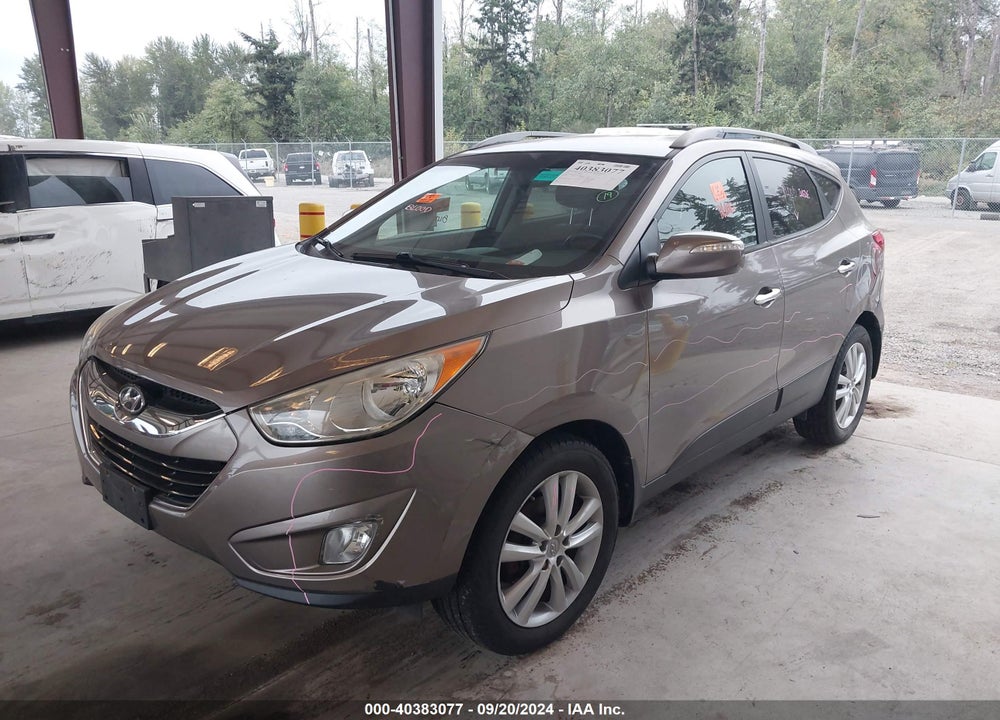 2012 HYUNDAI TUCSON LIMITED VIN: KM8JUCAC0CU544025