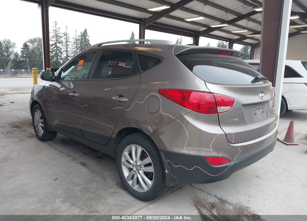 2012 HYUNDAI TUCSON LIMITED VIN: KM8JUCAC0CU544025