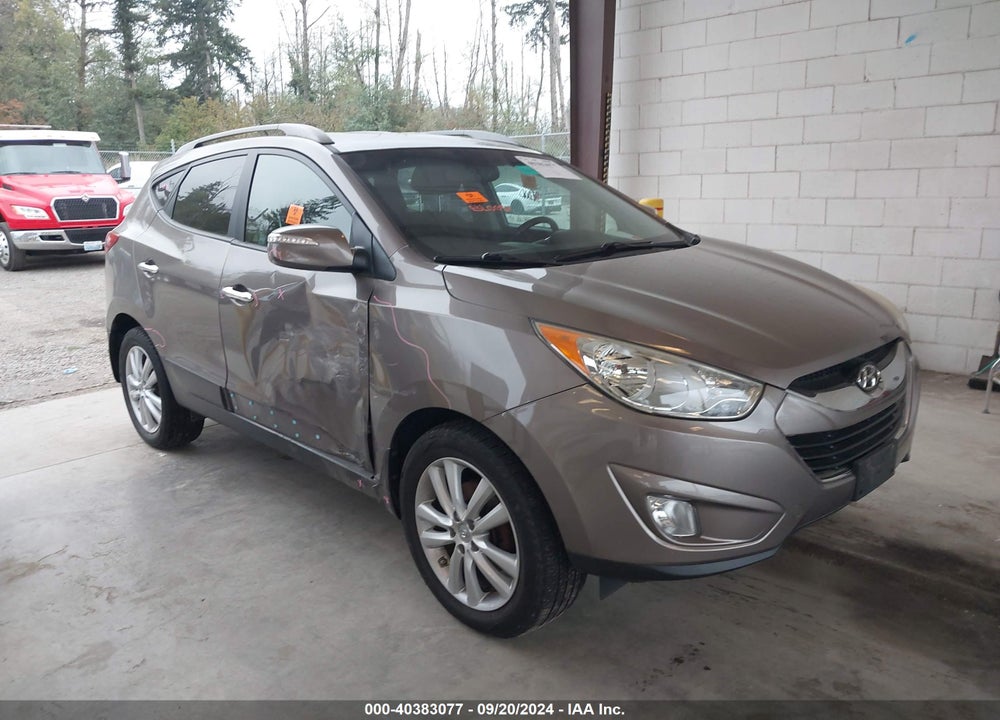 2012 HYUNDAI TUCSON LIMITED VIN: KM8JUCAC0CU544025