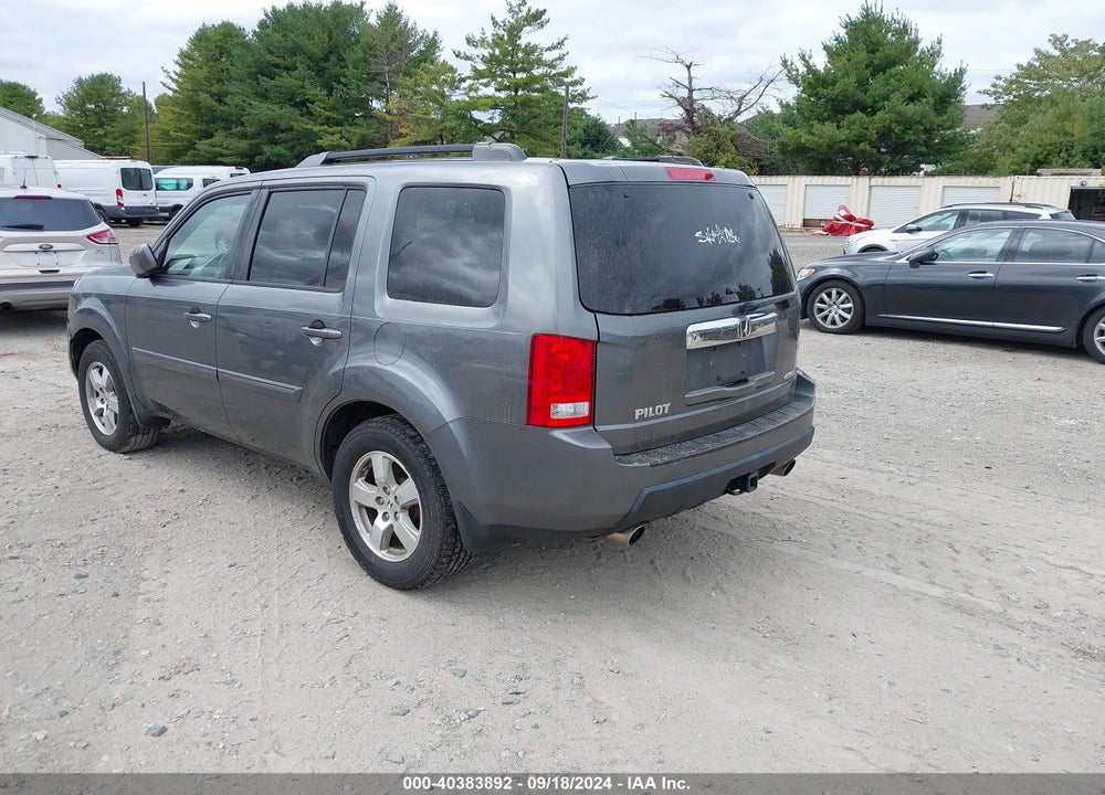 2011 HONDA PILOT EX-L VIN: 5FNYF4H51BB038186