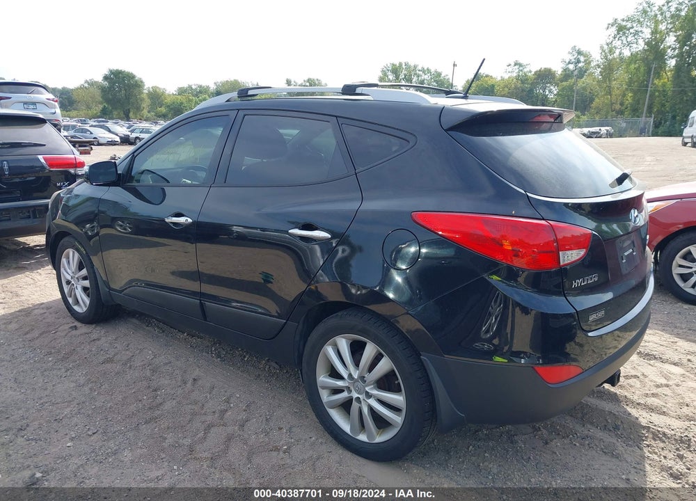 2012 HYUNDAI TUCSON LIMITED VIN: KM8JUCAC5CU404469