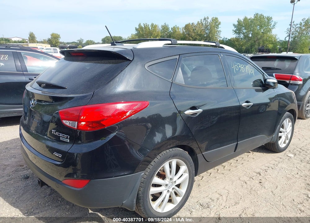 2012 HYUNDAI TUCSON LIMITED VIN: KM8JUCAC5CU404469