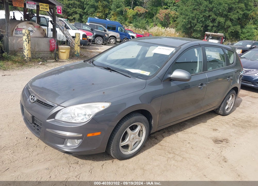 2009 HYUNDAI ELANTRA TOURING VIN: KMHDC86E09U042387