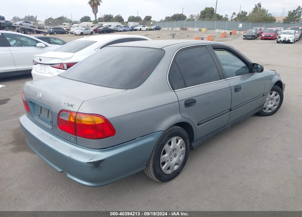 1999 HONDA CIVIC LX VIN: 2HGEJ6674XH566549