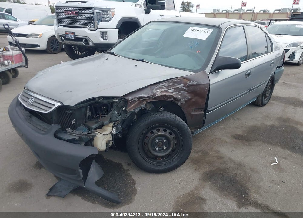 1999 HONDA CIVIC LX VIN: 2HGEJ6674XH566549