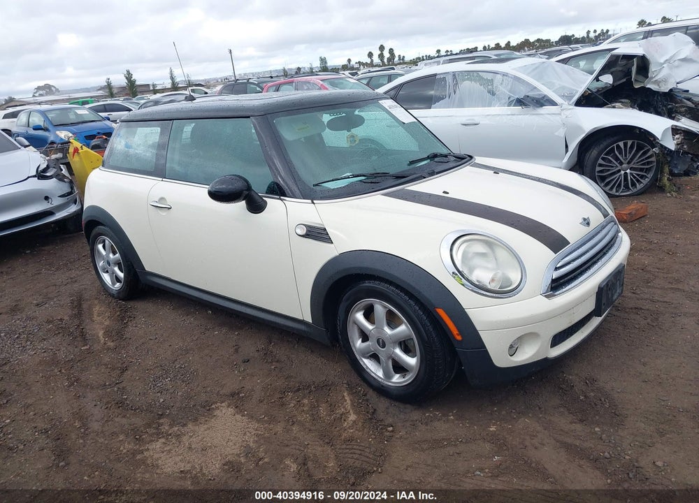 2009 MINI COOPER VIN: WMWMF33569TW71027