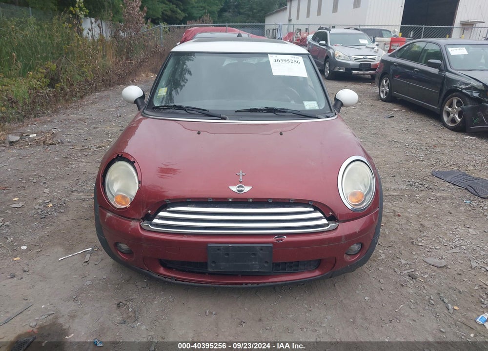 2009 MINI COOPER VIN: WMWMF33539TW73298
