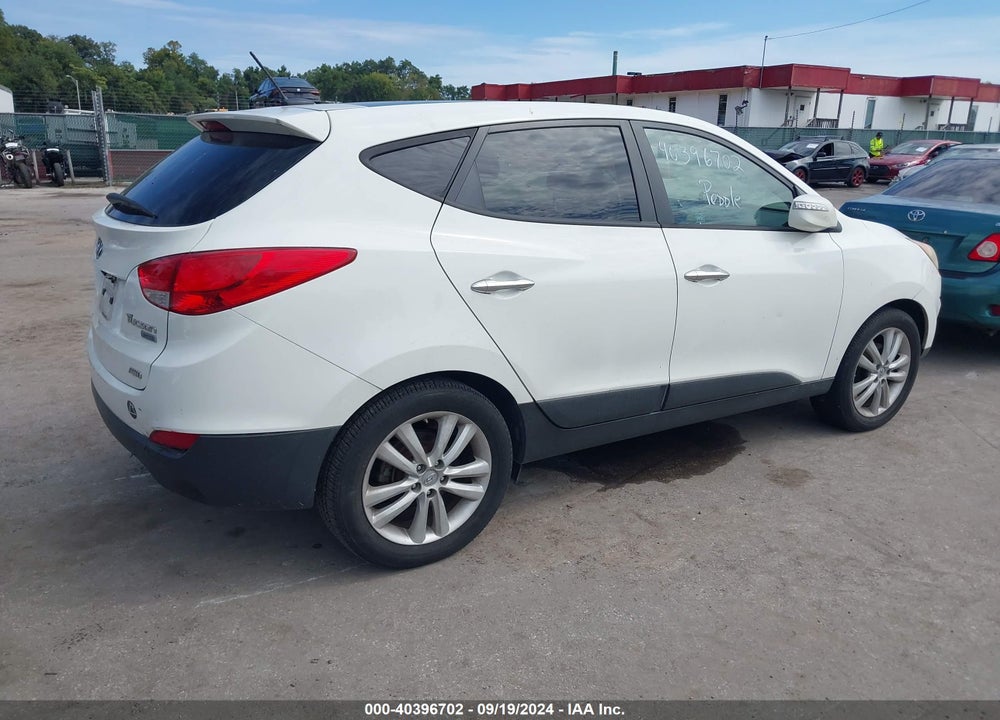 2012 HYUNDAI TUCSON LIMITED VIN: KM8JUCAC6CU534969