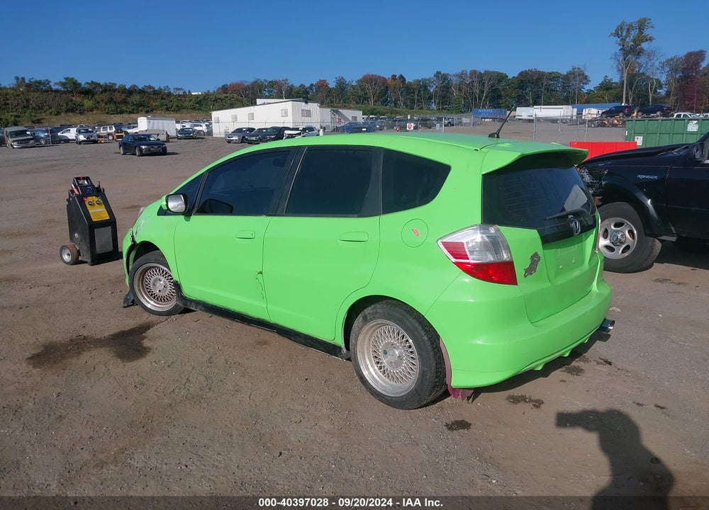 2011 HONDA FIT SPORT VIN: JHMGE8G58BC018648