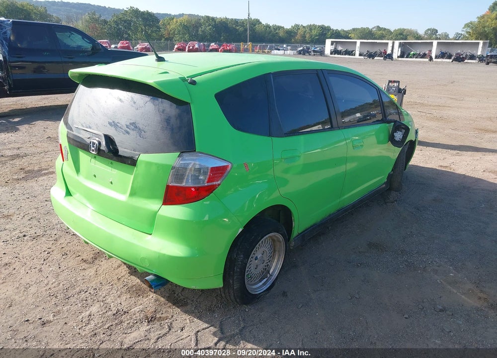 2011 HONDA FIT SPORT VIN: JHMGE8G58BC018648